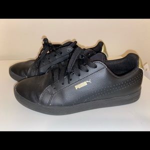 Puma women’s smash metallic black and gold
